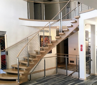 Overcoming Design Challenges: Cable Railing on Curved Staircases